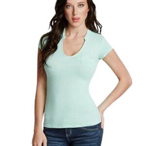 Guess women's v-neck t-shirt in mint green with a front pocket size Large
